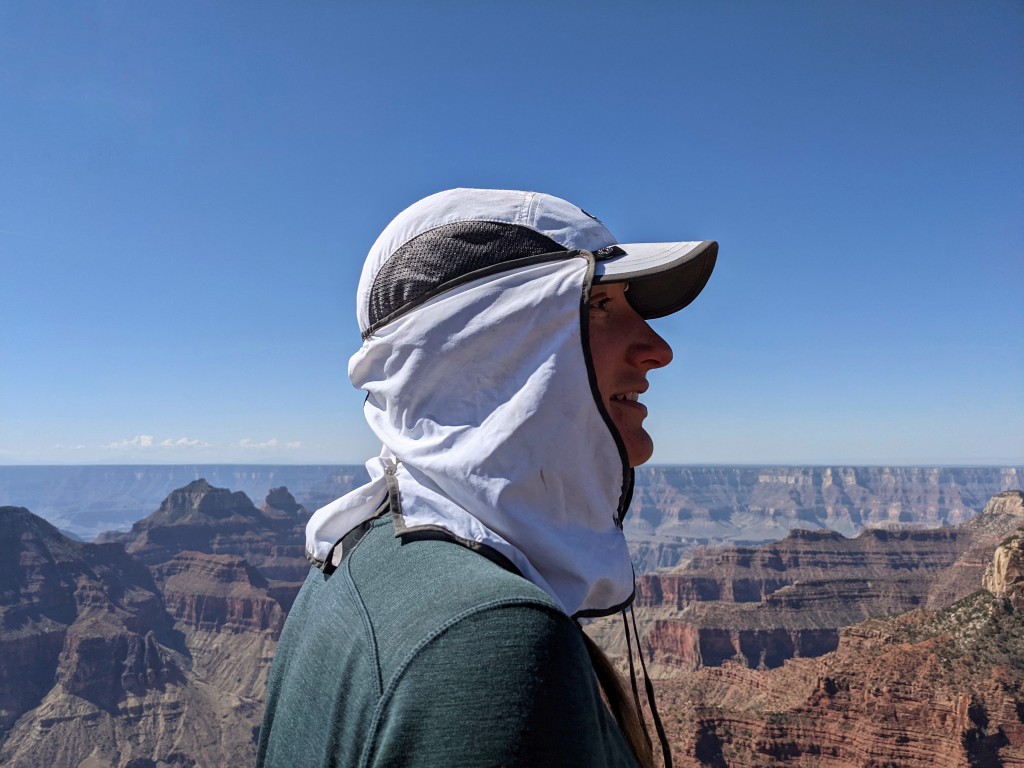 sun hat - the or sun runner&#039;s cape partially blocks the hat&#039;s mesh vents.